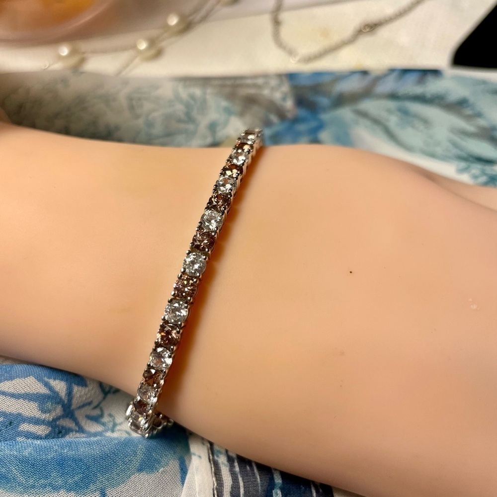 Cubic Zirconium Tennis Bracelet, Marked 925, 7”  Clear & Pale Pink Stones.